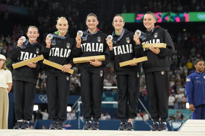 Italian Gymnast's Cheesy Past Is Bubbling Up