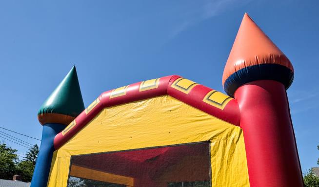 One Child Dead, Another Hurt After Bounce House Flies Away