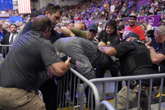 Man Faces Charges After Storming Media at Trump Rally