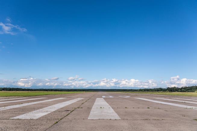 Propeller Kills Woman Taking Photos at Airfield