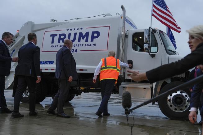 After Biden's 'Garbage' Comment, Trump Rides in Garbage Truck