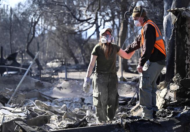 Palisades Fire Spreads, Threatens More Neighborhoods