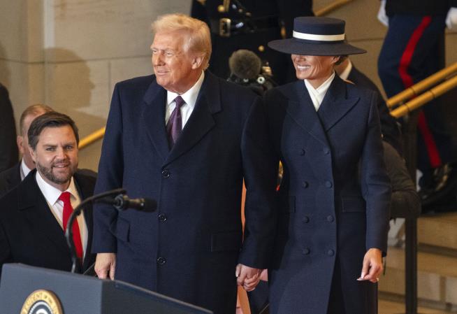 Melania Trump Steals Spotlight With Navy Hat