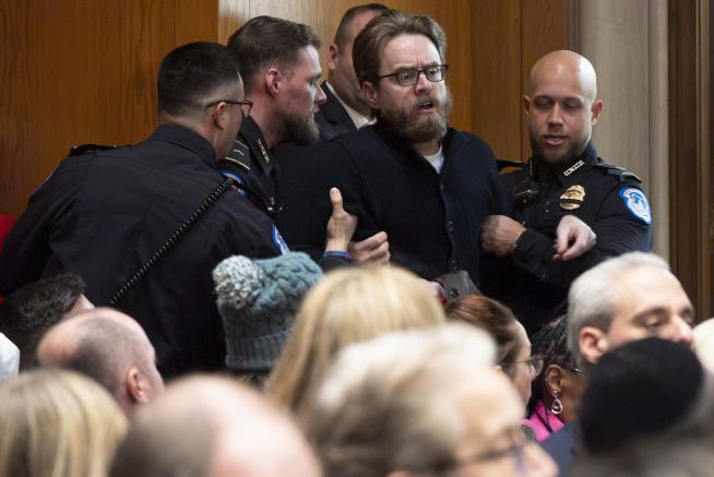 Protesters Interrupt McMahon Confirmation Hearing