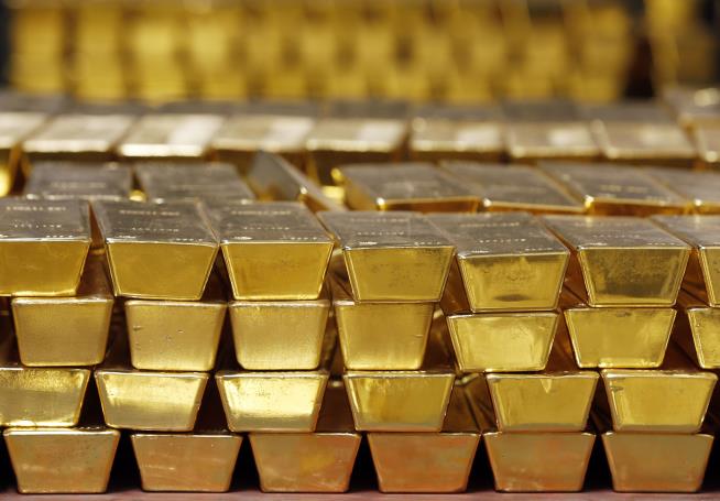 Gold Hits a Milestone, and May Keep Rising