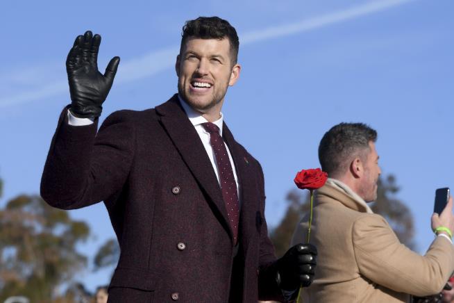 Bachelor Star Cheers Charges in Bizarre 'Paternity Scheme'
