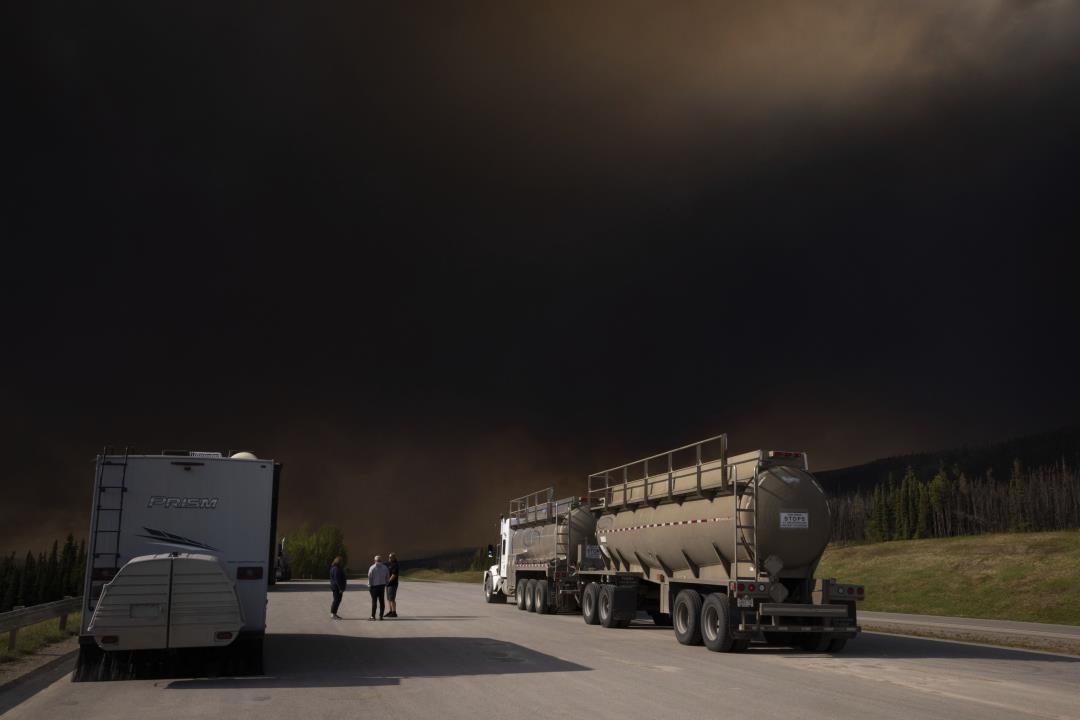 Wildfires Drive Evacuations in 3 Provinces