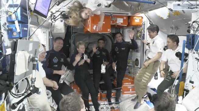 Toast With Drink Pouches Honors 3 Nations' Arrival at ISS