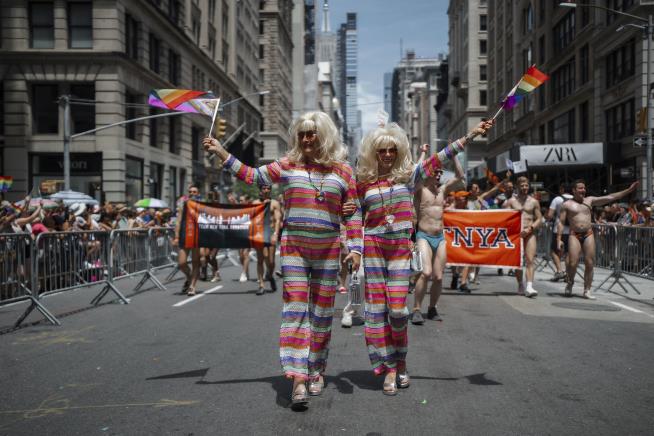 Defiant Marchers Gather for Pride Month Finales