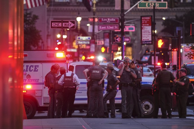 Gunman Opens Fire at Manhattan Offices, Kills Officer