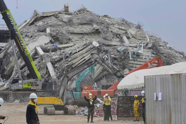 23 Charged in Deadly Skyscraper Collapse