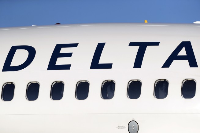 Delta Plane Clips Empty Jet at Gate