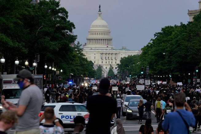 FBI Fires Agents Found in Pics Kneeling at Floyd Protests