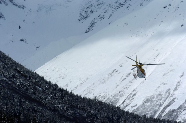 Search Continues for Friends After Heli-Skier's Body Found