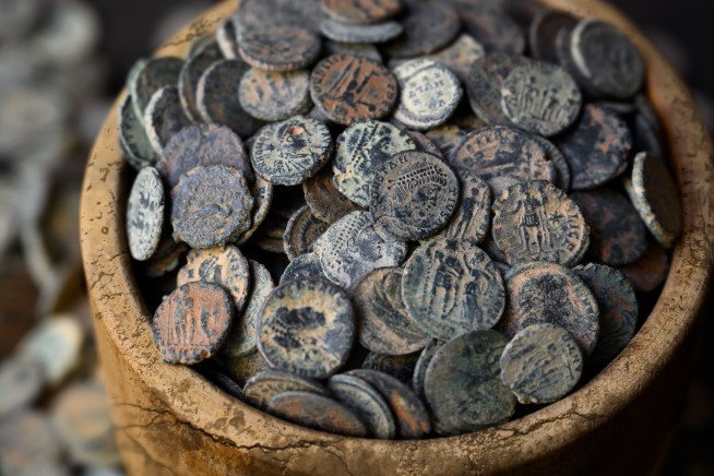 Metal Detector Uncovers Massive Haul of Ancient Coins