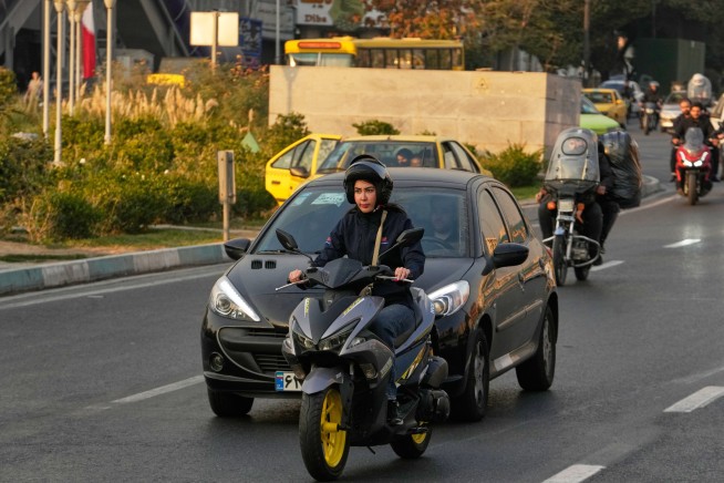On Streets of Tehran, Women on Motorbikes Mark a Shift