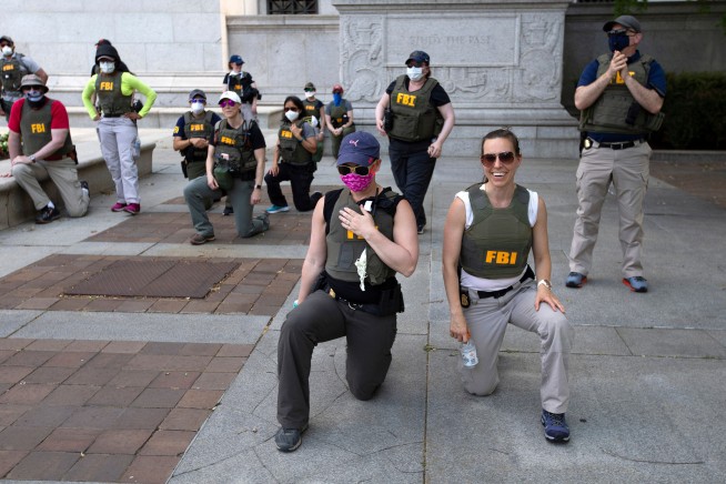 FBI Agents Fired for Kneeling at Protest Are Suing