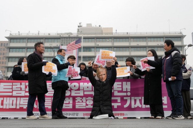 Analysis: Tariff Burden Falls Almost Totally on Americans