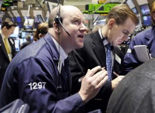 Dow Ticks Up Despite Job Woes