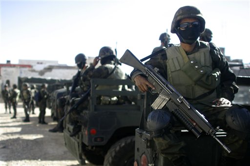Mexican Soldiers Charged With Protecting Cartel Capos