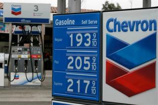 Exxon, Chevron Scramble to Protect $40B Cash Booty