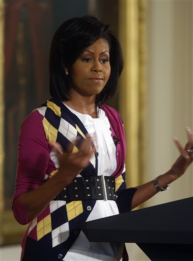 Popular Michelle Plays Up Domestic Side—For Now