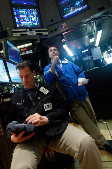 Cisco Disappoints; Dow Off 102