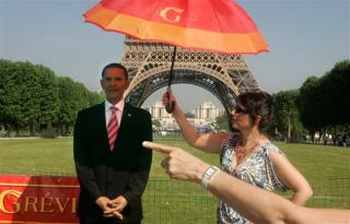 Wax Obama Tours Eiffel Tower