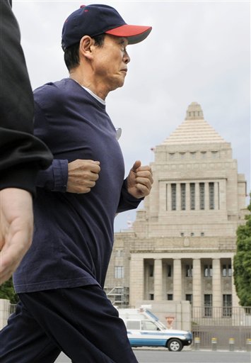 Facing Defeat, Japan PM Sets Election Date
