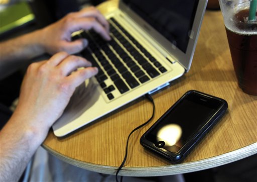Coffee Shops Grow Weary of Laptop Users