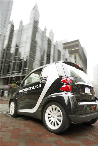 Tiny Smart Cars Zip Toward US