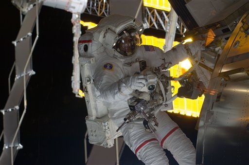 Approaching Debris Doesn't Stop Spacewalk