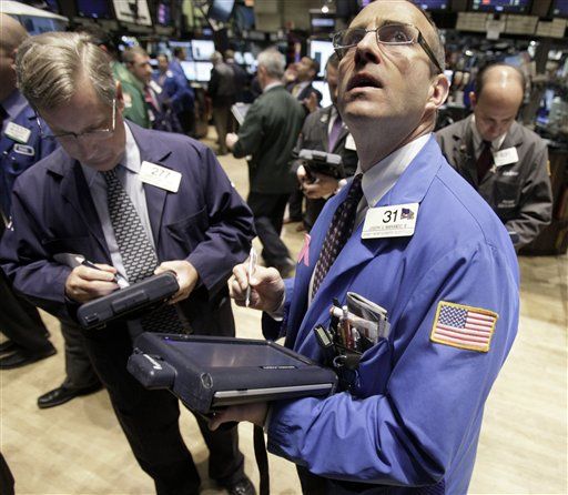 Dow Drops 67, Sinks Below 10,000, on IBM, BoA Reports