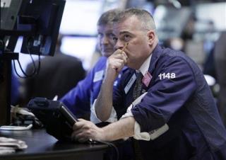 Dow Falls 104, Closes Under 10,000