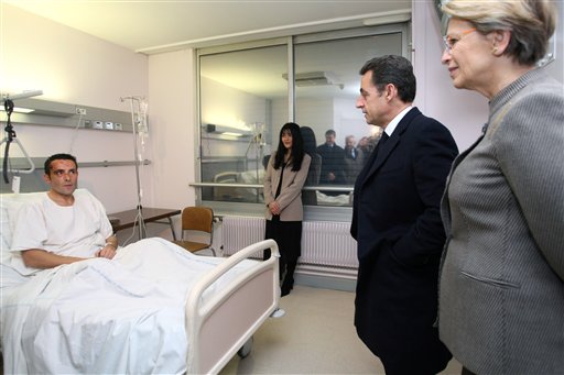 Sarkozy Vows to Punish Rioters