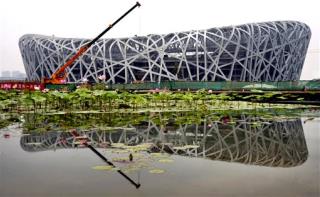 Beijing Olympics Displacing 1.5M