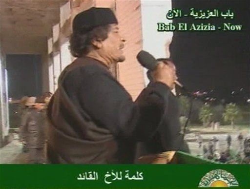 Moammar Gadhafi Remains Defiant in Tripoli: Vows Victory, Says, 'I Am Here'