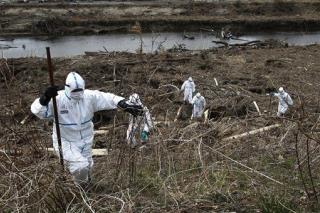Japan's Search for Bodies Enters Evacuation Zone