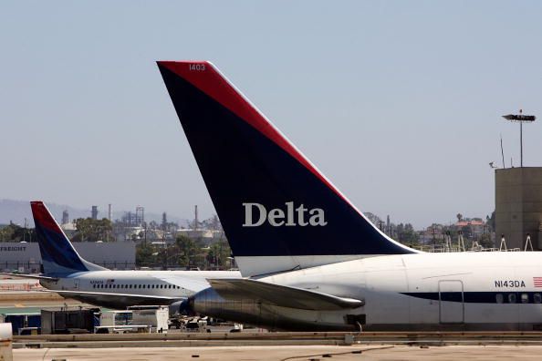 Delta Jet Catches Upon Landing in Atlanta; No Injuries Reported