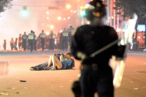 Vancouver Couple Kissing Amid Riots Identified as Scott Jones and Alexandra Thomas