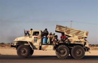 Anti-Gadhafi Forces Claim Control of His Hometown