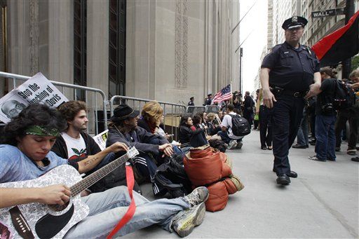 Protesters Descend on Wall Street