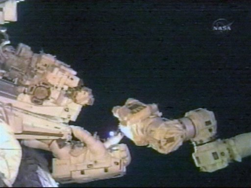 Spacewalkers Give Dextre Arms
