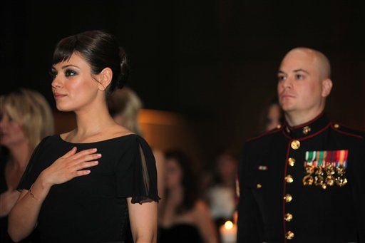 Mila Kunis Attends Marines Ball With Scott Moore