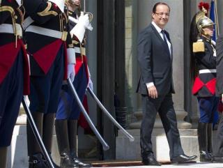 Hollande Slashes French CEOs' Pay