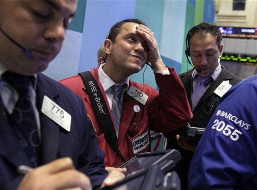Dow Plunges 200 on Bad Earnings