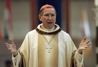 Top Cardinal Relieved of Duties in Abuse Crisis