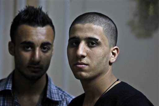 Hamas Cops Grabbing Young Men, Shaving Their Heads