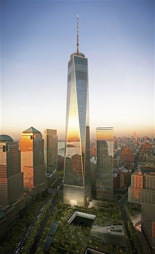 World Trade Center Spire Hoisted to Roof