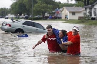 Woman Swept From Car, Dies, in Texas Floods